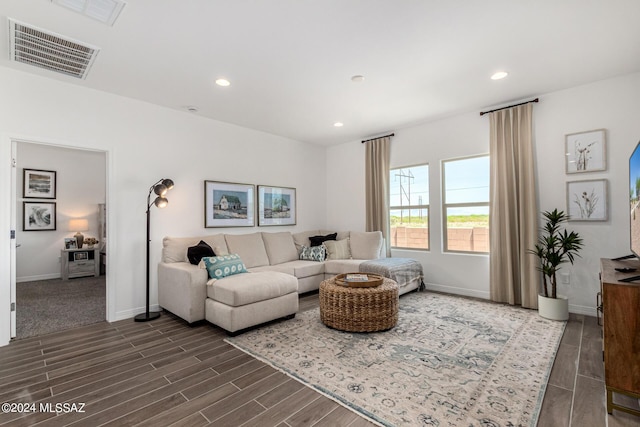 living room featuring recessed lighting, visible vents, and wood tiled floor