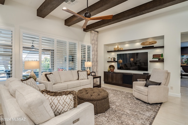 living room with beam ceiling, ceiling fan, and light wood-type flooring