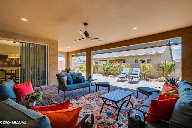 view of patio / terrace featuring an outdoor living space and ceiling fan