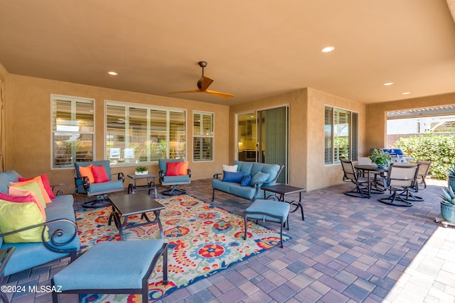 view of patio / terrace featuring ceiling fan and an outdoor hangout area