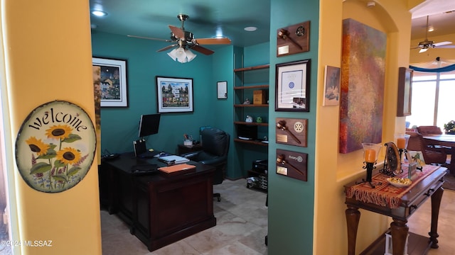 home office with ceiling fan