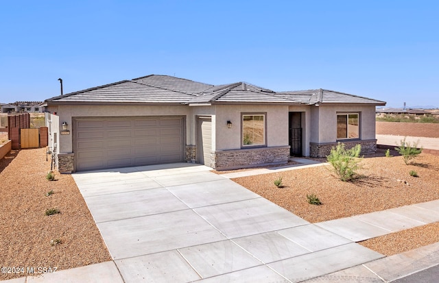 prairie-style home with a garage