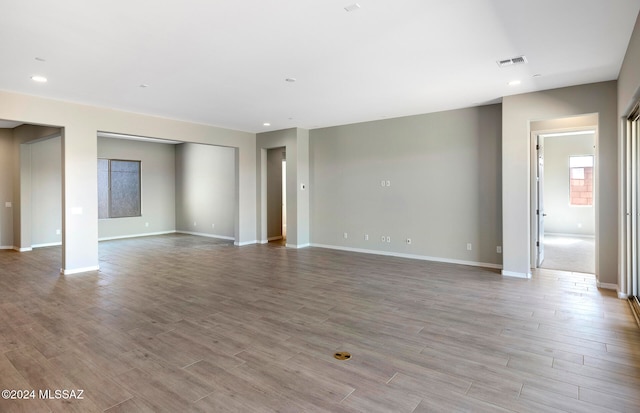 spare room with light hardwood / wood-style flooring