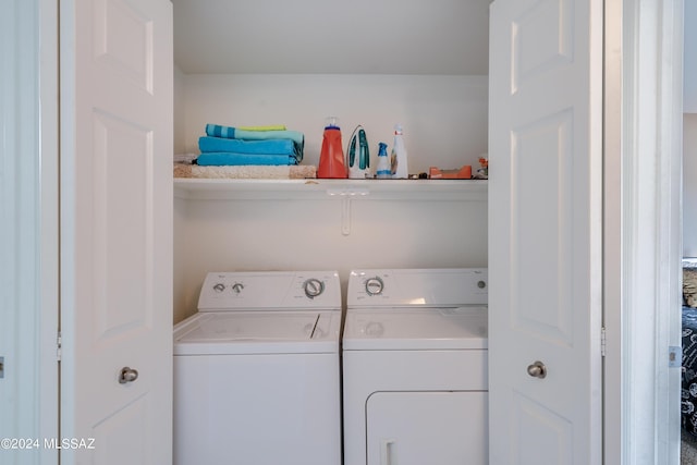 clothes washing area with laundry area and washing machine and dryer