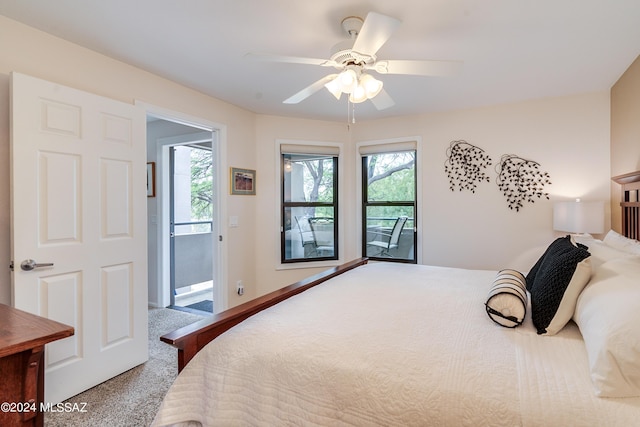 bedroom with ceiling fan, access to outside, multiple windows, and carpet floors