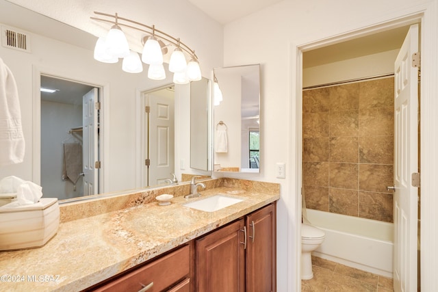 full bathroom with visible vents, toilet, shower / bathtub combination, tile patterned flooring, and vanity