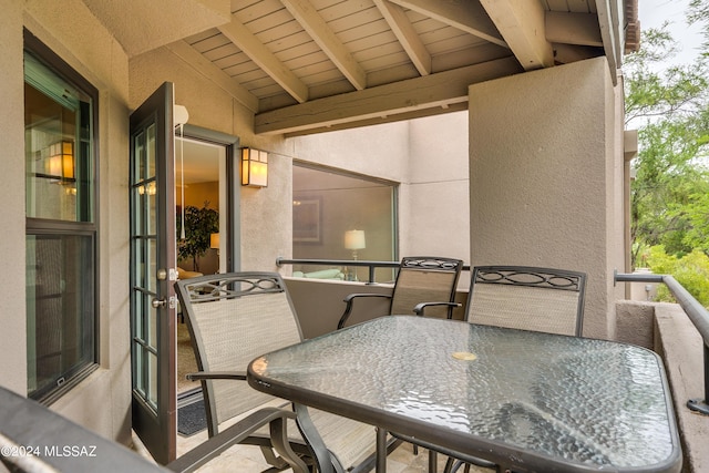 balcony featuring a sunroom