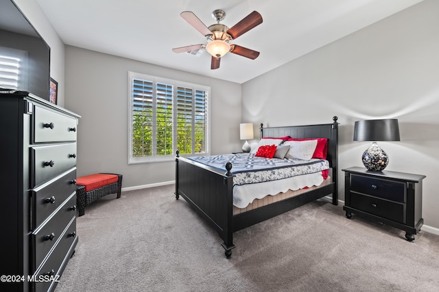 bedroom featuring ceiling fan and carpet floors