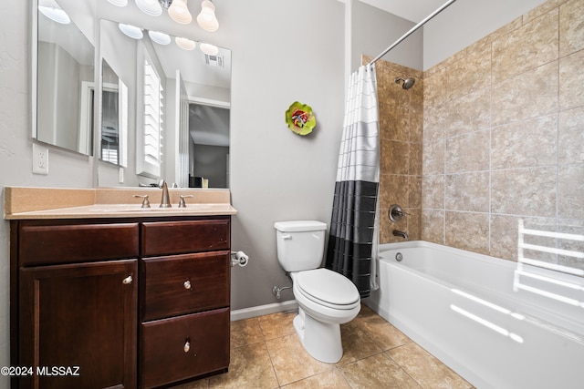 full bathroom featuring tile patterned flooring, shower / tub combo with curtain, vanity, and toilet