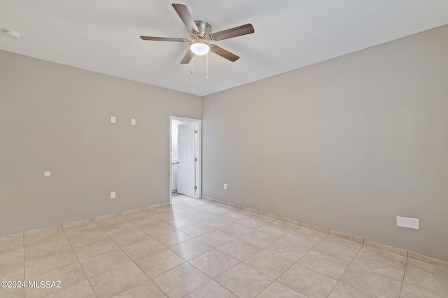 6860 W Walking M, Tucson, AZ 85757 - unfurnished room with ceiling fan and light tile patterned floors