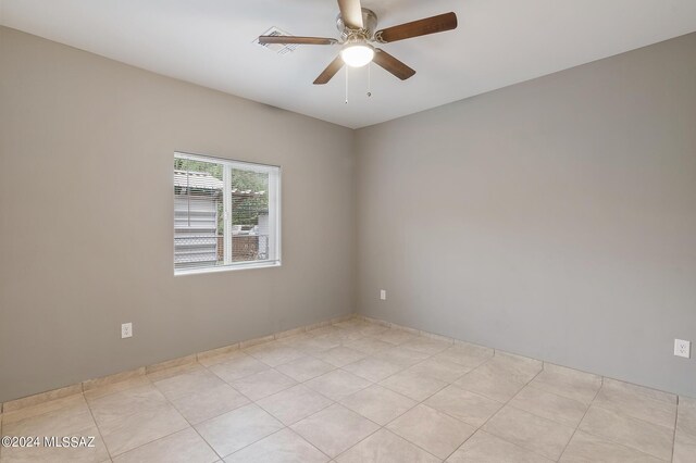 6860 W Walking M, Tucson, AZ 85757 - empty room featuring a ceiling fan and visible vents