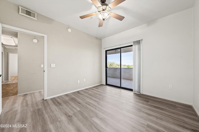 unfurnished room featuring ceiling fan and light hardwood / wood-style floors