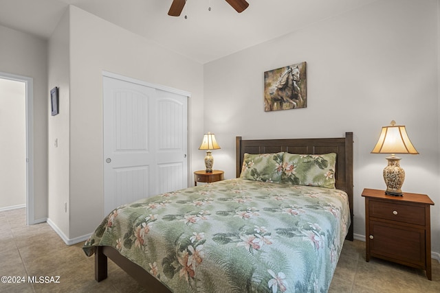 bedroom featuring ceiling fan and a closet