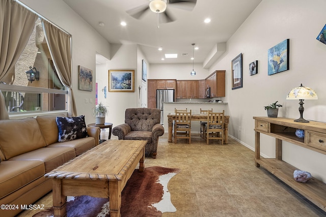 living room featuring ceiling fan