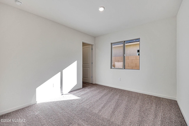 unfurnished room with carpet