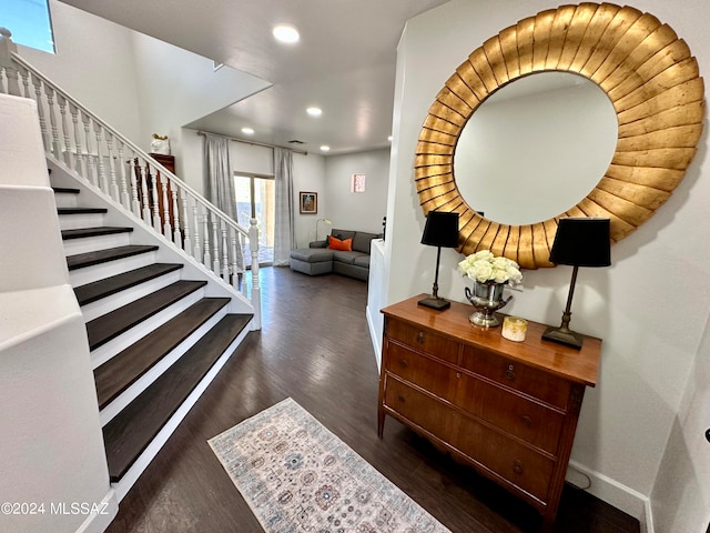 foyer with dark hardwood / wood-style flooring