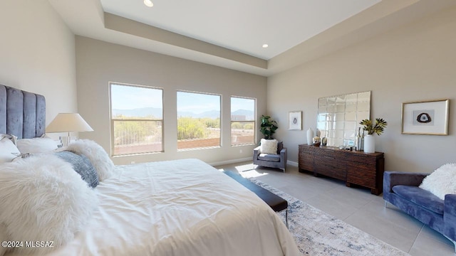 bedroom with a raised ceiling