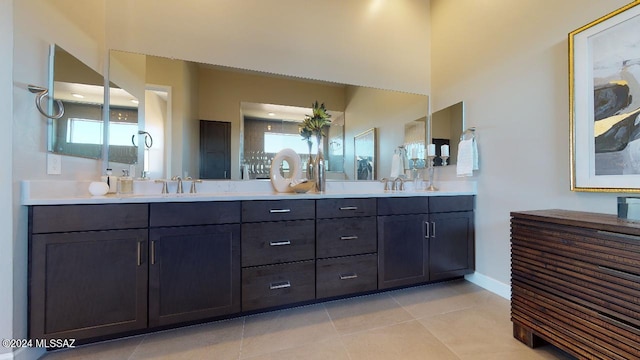 bathroom featuring tile patterned floors and vanity