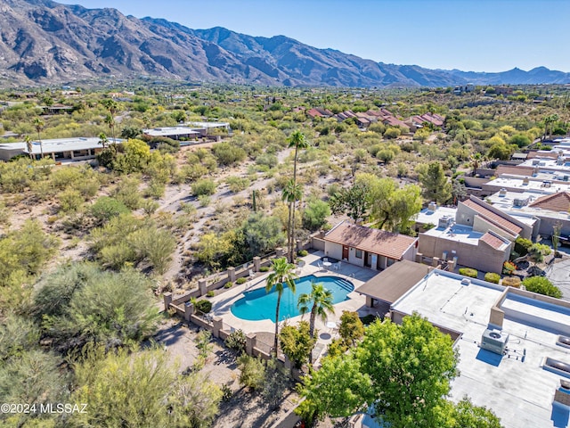 drone / aerial view featuring a mountain view