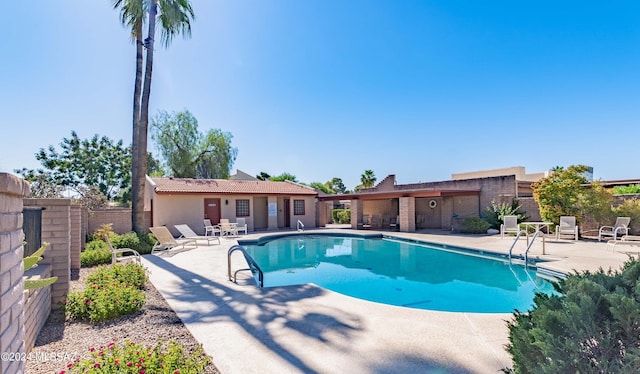 view of pool with a patio