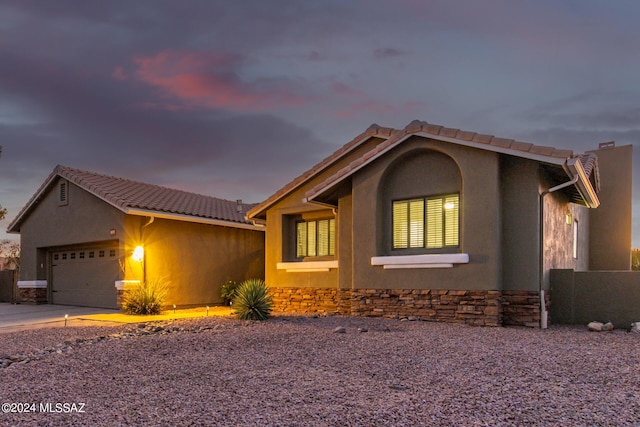 view of front of house with a garage