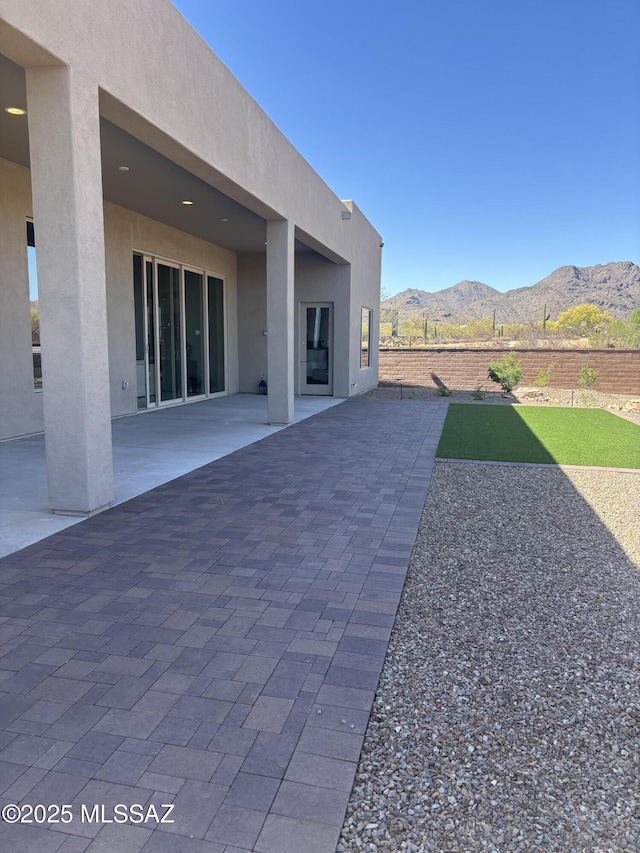view of patio with a mountain view