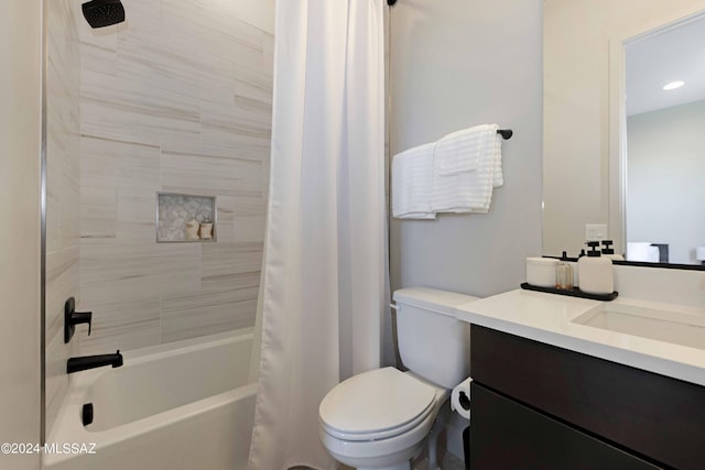 full bathroom featuring vanity, shower / tub combo with curtain, and toilet