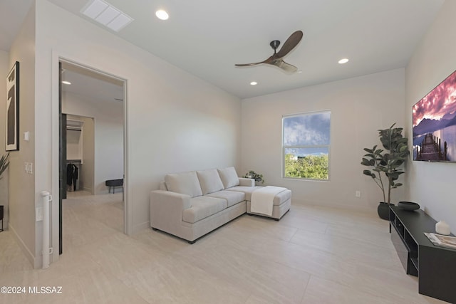 living room featuring ceiling fan