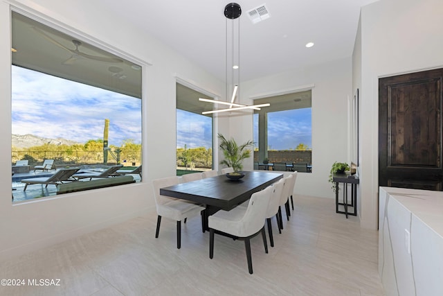 dining space featuring a chandelier