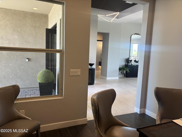 office space with baseboards