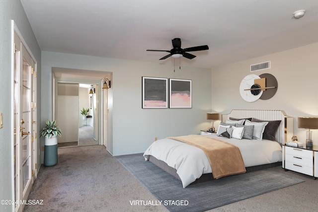 bedroom featuring ceiling fan and carpet floors