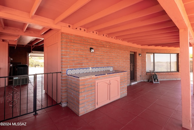 view of patio with exterior kitchen