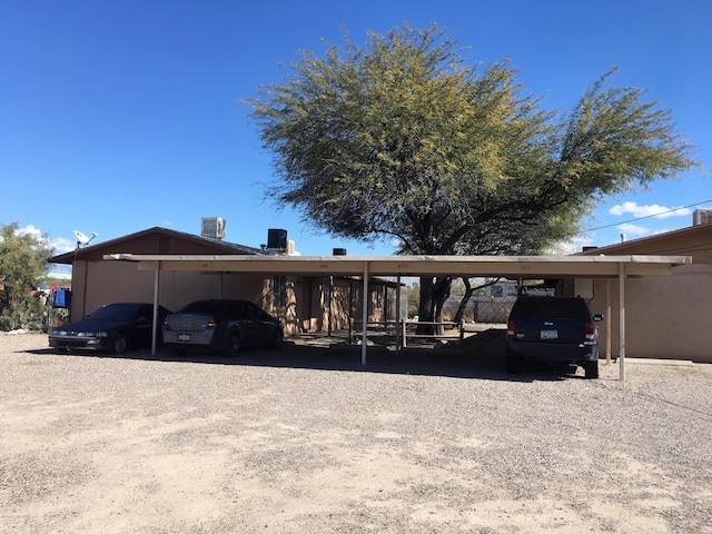 view of front of property with a carport