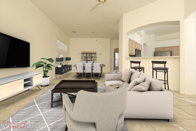 living room featuring ceiling fan and light tile patterned flooring