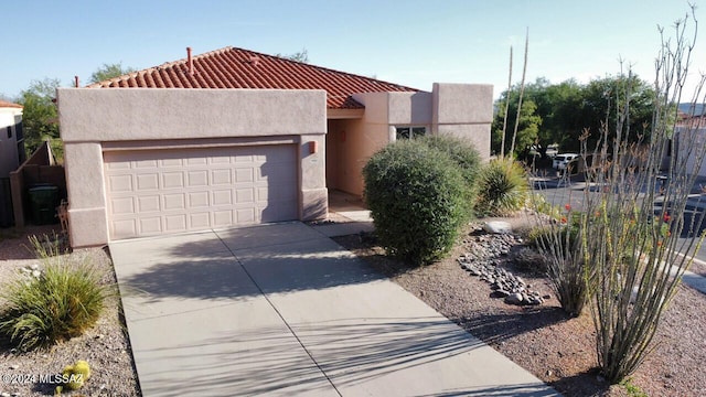 view of front of property featuring a garage