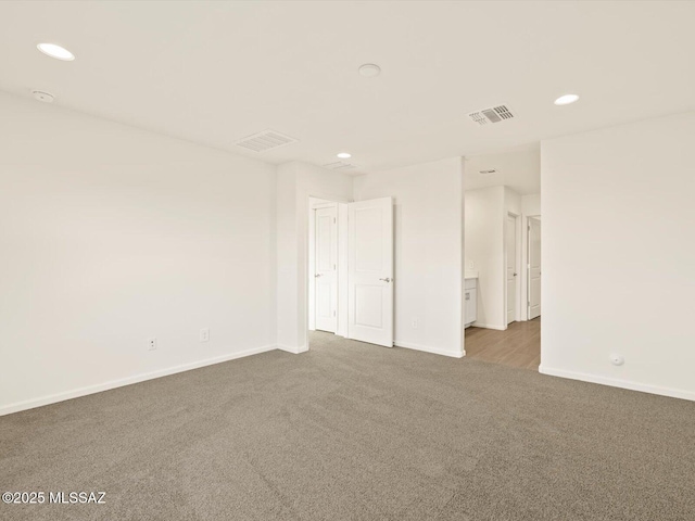 unfurnished room featuring carpet flooring