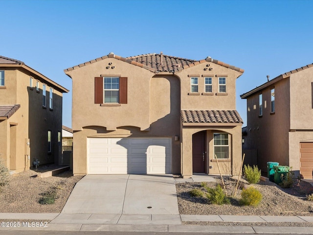 mediterranean / spanish-style home featuring a garage