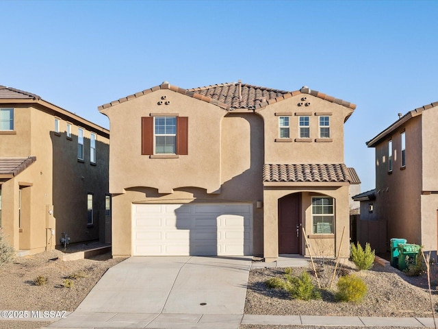 mediterranean / spanish-style house featuring a garage