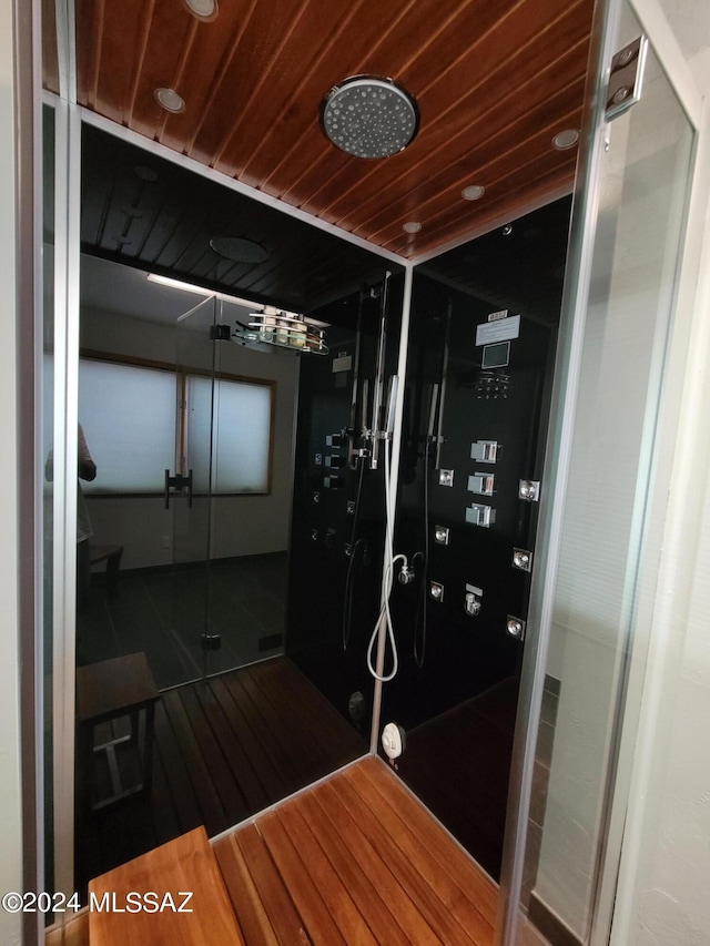 interior space featuring wood ceiling and hardwood / wood-style flooring