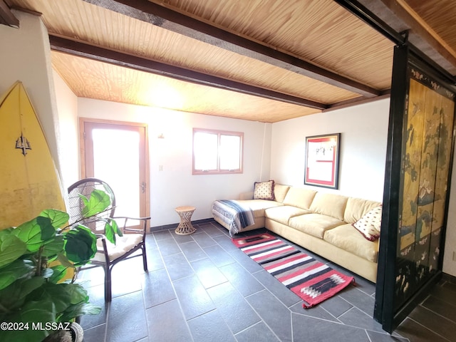 living room with wood ceiling and beamed ceiling