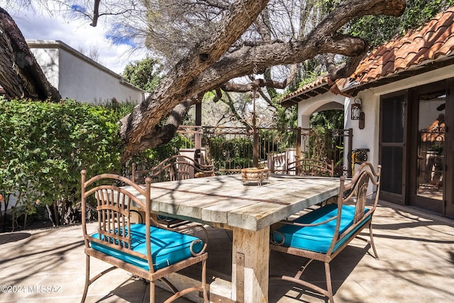 view of patio with an outdoor bar