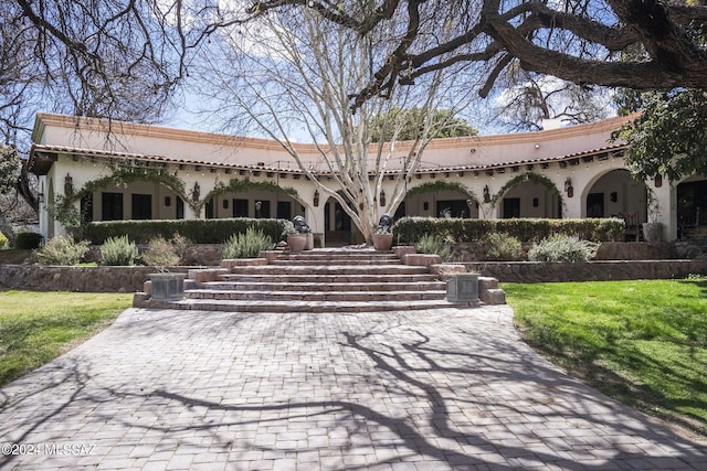 view of front of home with a front yard