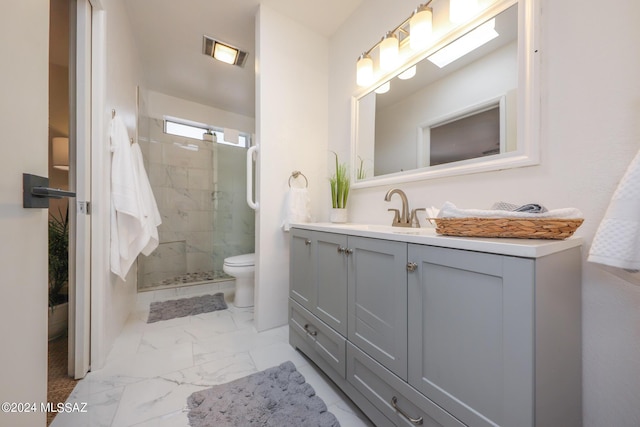 bathroom with walk in shower, vanity, and toilet