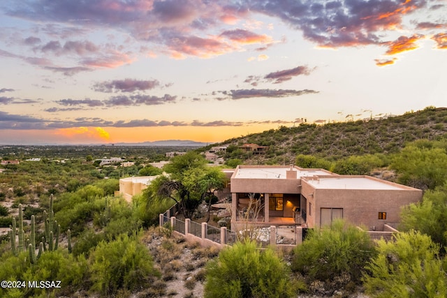 view of aerial view at dusk