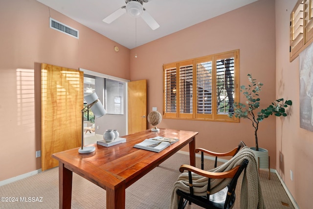 office area with light carpet and ceiling fan