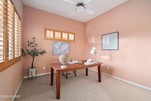 office area featuring carpet flooring and ceiling fan