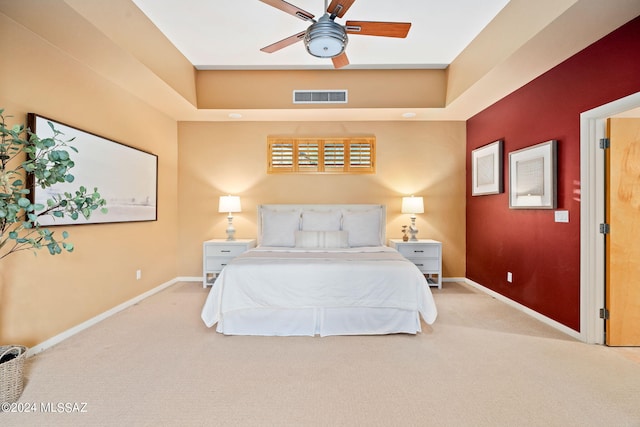 bedroom featuring ceiling fan and light colored carpet