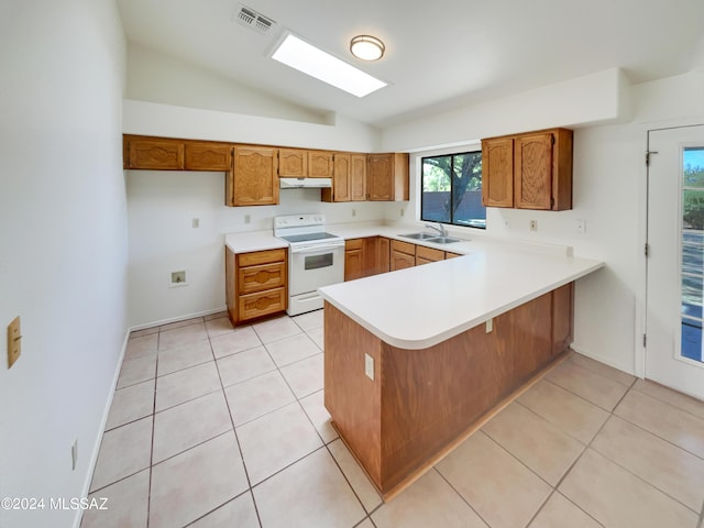 kitchen with white range with electric cooktop, sink, vaulted ceiling, light tile patterned floors, and kitchen peninsula