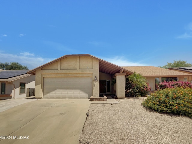 single story home with a garage