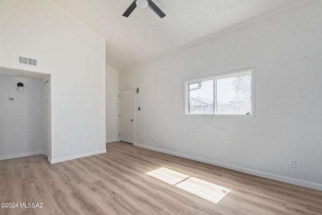 unfurnished room with light wood-type flooring and ceiling fan